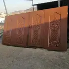 باب كبير حديد 4في في ارتفاع 2 متر ضرفتين ويوجد سحاب وليزر