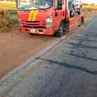 سطحه شمال شرق الرياض لنقل السيارات المعطله وتقدير الحوادث