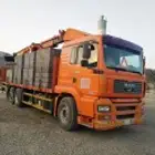 Block crane for transporting blocks inside and outside Medin