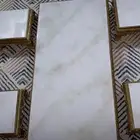 طاوله ارضيه سراميك مع اربع خدمه