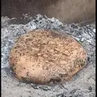 خبز مقنا بالشث على النار