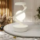 ابجورة حلزوني تحتوي على شحن وايرليس فيها الوان متعددة