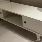 طاوله تلفزيون عرضها تقريبا متر وعشرين