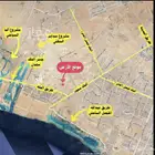 للبيع نص ارض مخطط 99 الجزء ج حي البحيرات مس 450 ش 16