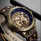 ساعة ميكانيكية من النحاس العتيق بتصميم قديم مع حزام جلدي