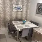 طاولة مربعه ب8 كراسي من هوم سنتر