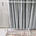 استاند ملابس و طاولة تتقفل