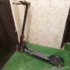 سكوتر كهربائي وقوف
