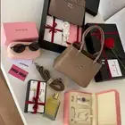 هدايا اطقم شنط ماركه ديور وماركه مياو