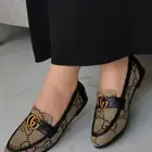 شوزات ماركة قوتشي وفندي ولويس