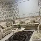 طقم كنب مع مفرشه