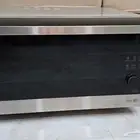 إل جي ميكروويف و فرن كانويكشن مع شوايه. شبه جديدة