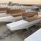 كراسي خرسانية واحواض زرع