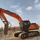 بوكلين حفر هدم ترحيل مخلفات بناء جدران حجر رقم