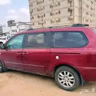سياره كيا كرنفال لون احمر للبيع في صامطه