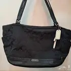 شنطة ماركة كوتش اصلية استخدام بسيط السعر150