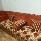هذا كنب طول سبعه وعرض أربعة يتكون من تسع كنبات وثلاث زوايا
