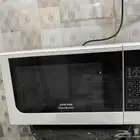 مايكرويف وطاول اقل من 65 بوصه
