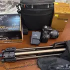 كاميرا نيكون 5600 مع كامل ملحقاتها شبه جديده