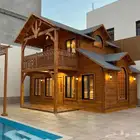 تصميم وبناء الأكواخ الخشبية