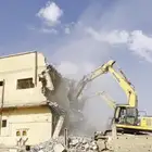 بوكلين هدم مباني قديمه مقابل الحديد