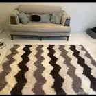 كنبة مع سجادة