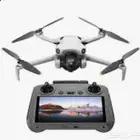 درون DJI - Mini 4 Pro مستخدمة بحالة الوكالة