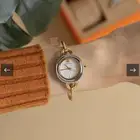 ساعة Tory Burch موديل راقي مع إمكانية تغير الإطار