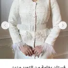 فستان فخم من Orcheda   تصميم شتوي أنيق بلون بيج