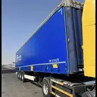 نقل طرود على شاحنات الى جميع انحاء المملكة