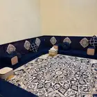 مجلس ارضي مع سجاده وستاره وطاولات خدمه