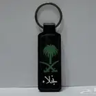الطباعه على ميدالية ومحفظة توزيعات اليوم الوطني