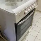 بوتجاز غاز 4 عيون مع فرن 4-Burner Gas Stove with Oven