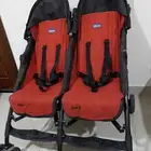 عربة أطفال تؤم