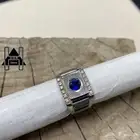 خاتم فضة إيطالي راقي عيار 925 بفص ياقوت ازرق وفصوص زركون