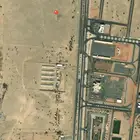 أرض تجارية للبيع على الطريق العام