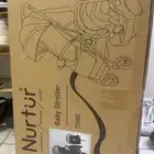 سياره اطفال مع كرسي ماركه نورتر ما انفك كرتونه