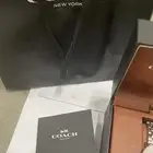 ساعة كوتش من متجر كوتش الأصل