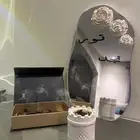 مرايا مزينة بالورد والكتابه