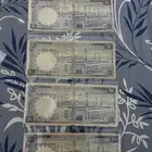 عملات الملك خالد والملك فيصل
