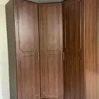 دولاب تخزين وملابس على شكل زاويه