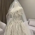 فستان فرح لبس لمره واحده مع تاج وطرحه