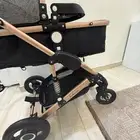 عربة اطفال فخمه