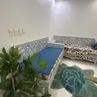 حوش فيه غرفتين وحمام للإيجار (عند محطه رفال )