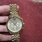 ساعه مايكل كورس ذهبي رجالي mikel courus watch oroginal