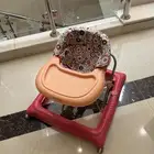 مشاية اطفال و مفرش جديد بناتي و كرسي هزاز بيبي