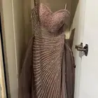 فستان مابين الوردي والمو  استخدام مره وحده مقاس سمول ب 900