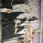 هذي  هذي لوحة فنية فيها صورة الملوك خام
