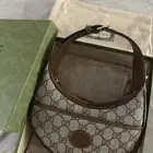 شنطة قوتشي اصليه بكامل ملحقاتها