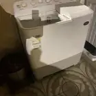 غسالة ومكنسة